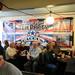 Supporters wait for Republican presidential candidate Herman Cain to make an appearance at the Big Sky Diner in Ypsilanti during a stop on Thursday morning. Melanie Maxwell I AnnArbor.com